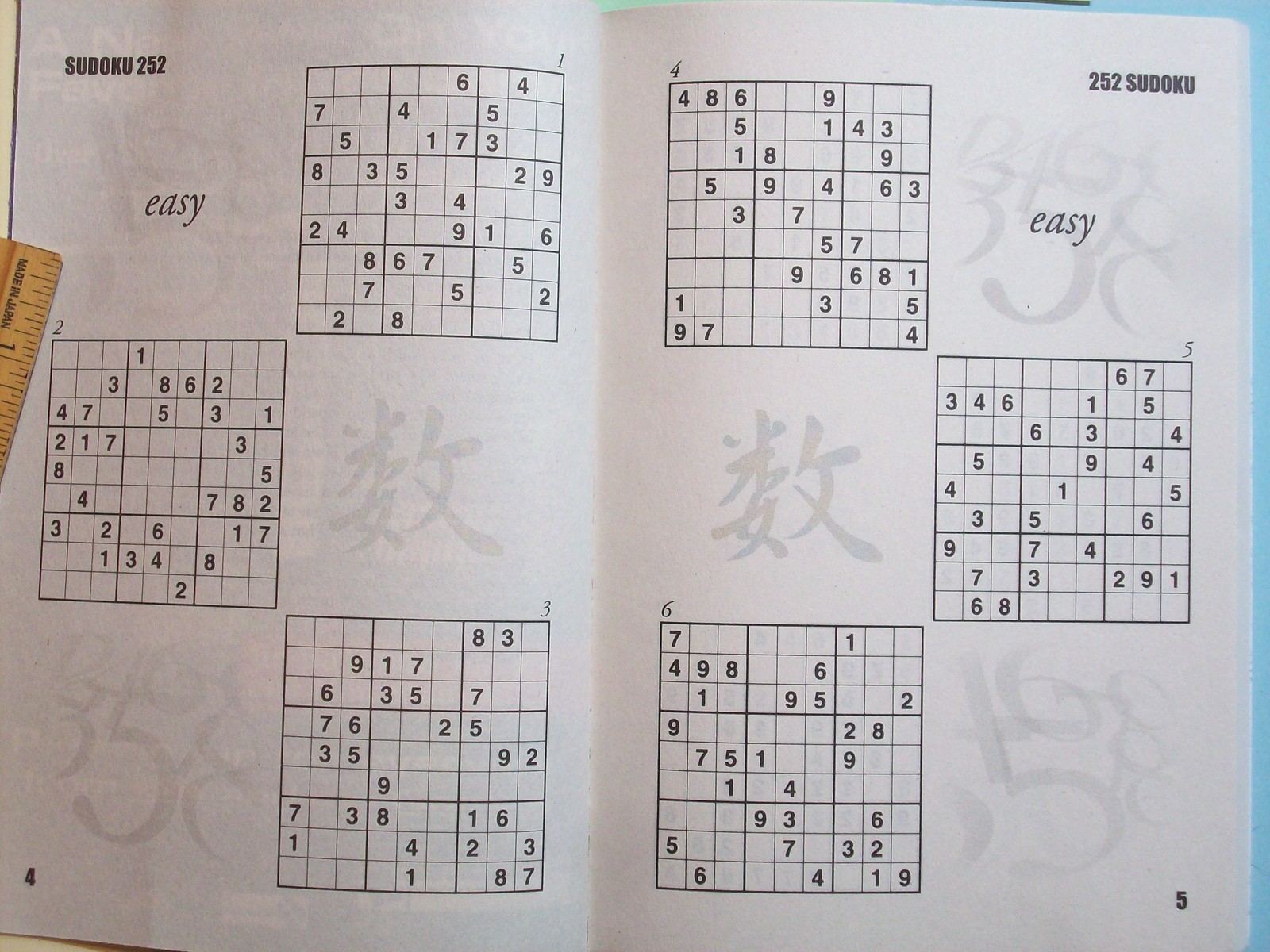 BOOK SUDOKU 252 PUZZLES DECEMBER 2008 BRAIN FOOD TO BOOST YOUR MEMORY 96 PAGES 7