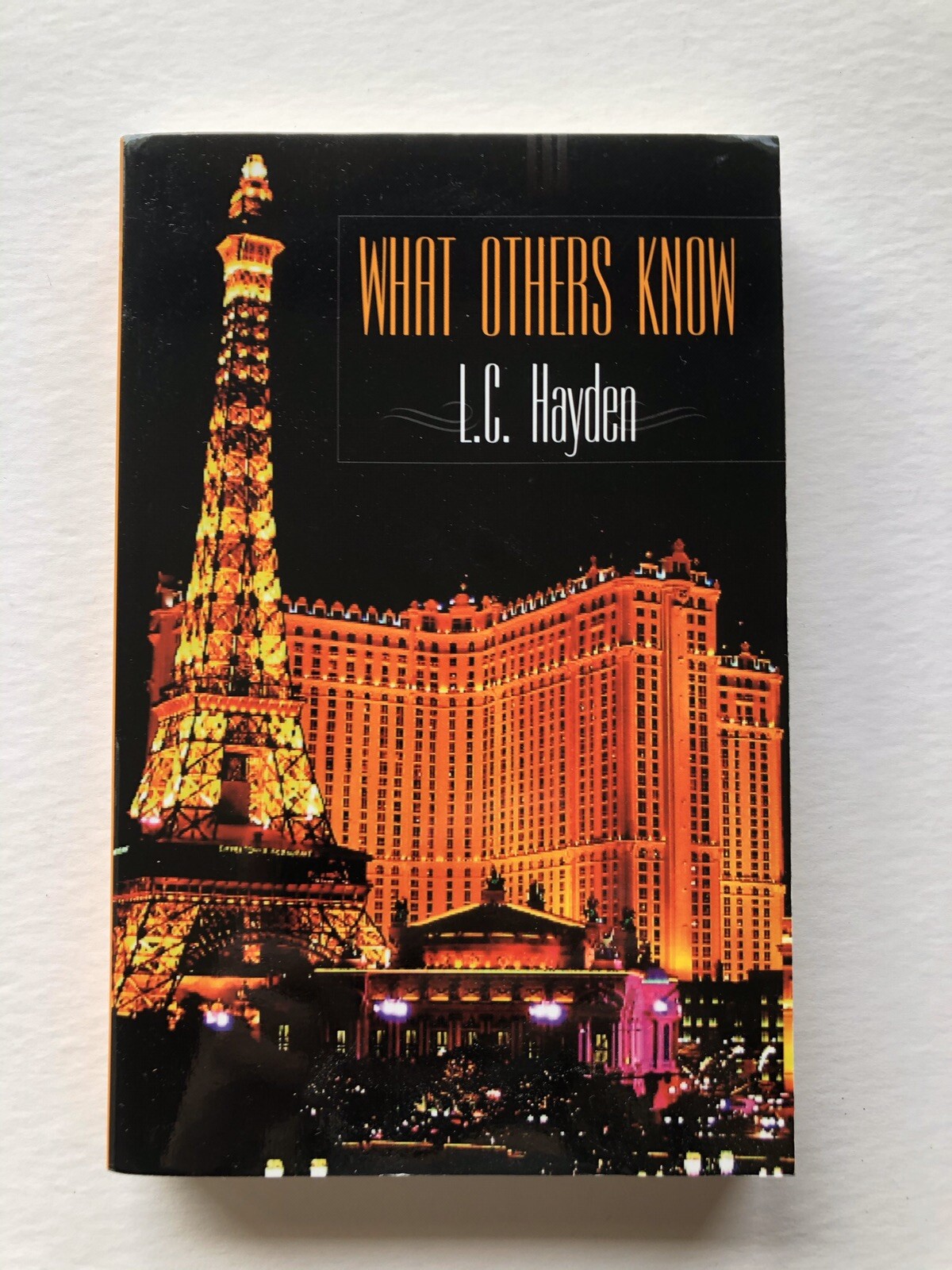 What Others Know by L. C. Hayden Signed by author