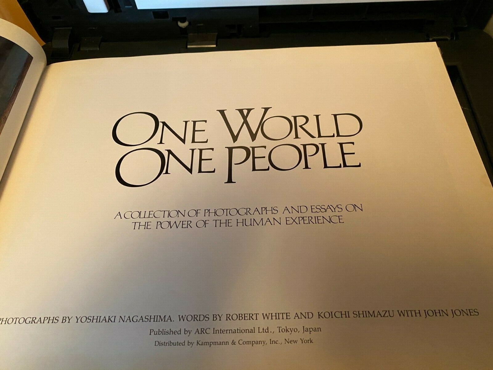 One World, One People: A Collection of Photographs and Essays on the Power