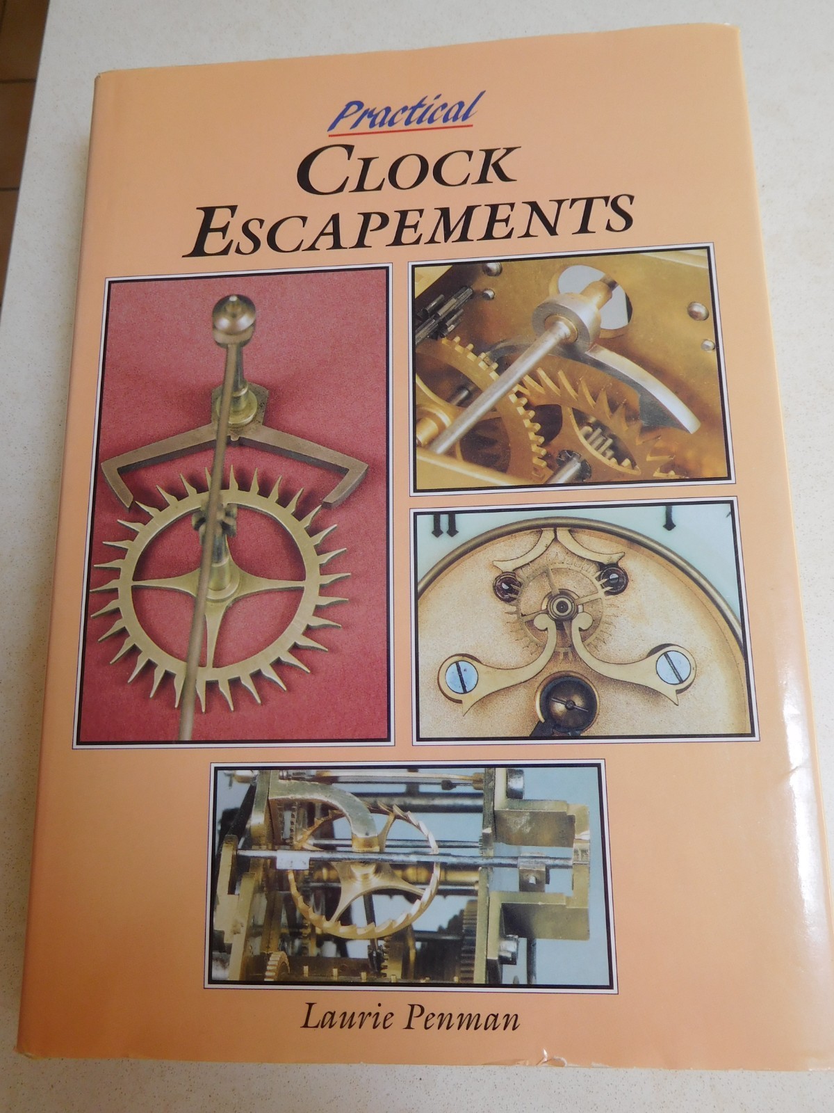 PRACTICAL CLOCK ESCAPEMENTS – LAURIE PENMAN – HARDCOVER WITH DUST JACKET – EXC