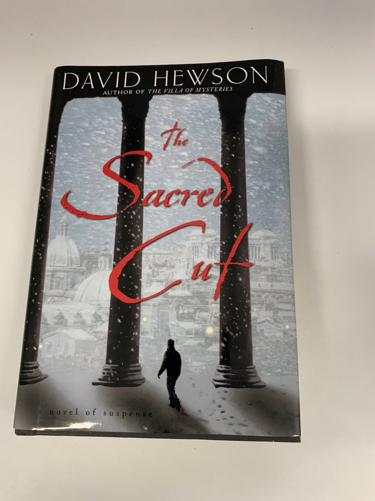 Delacorte Press The Sacred Cut by David Hewson A Novel Of Suspense Hardcover