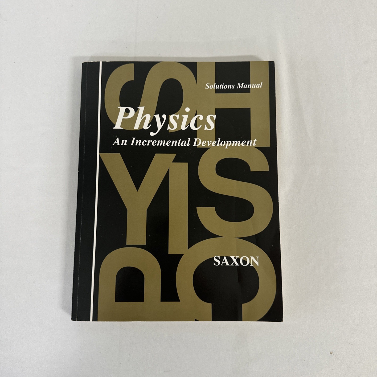 Physics :An Incremental Development Textbook & Solution Manual by John H. Saxon