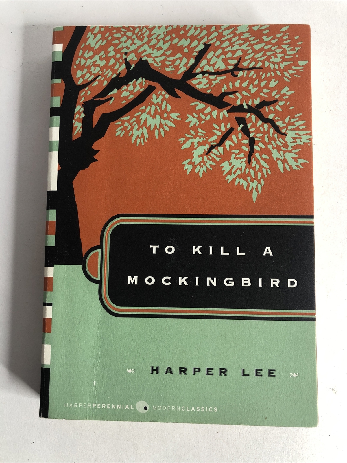 To Kill a Mockingbird PAPERBACK– Deckle Edge, 2006 by Harper Lee