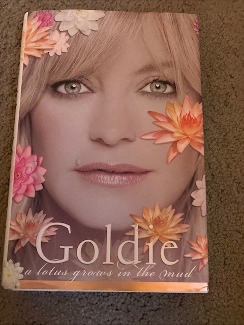 a lotus grows in the mud Signed by Goldie Hawn