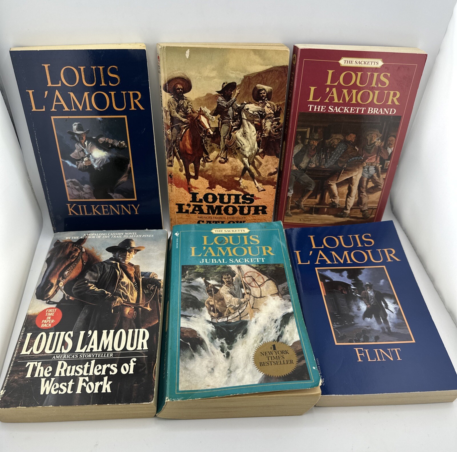 Lot of 6- LOUIS L’AMOUR – Paperback Western Books – Mixed Titles