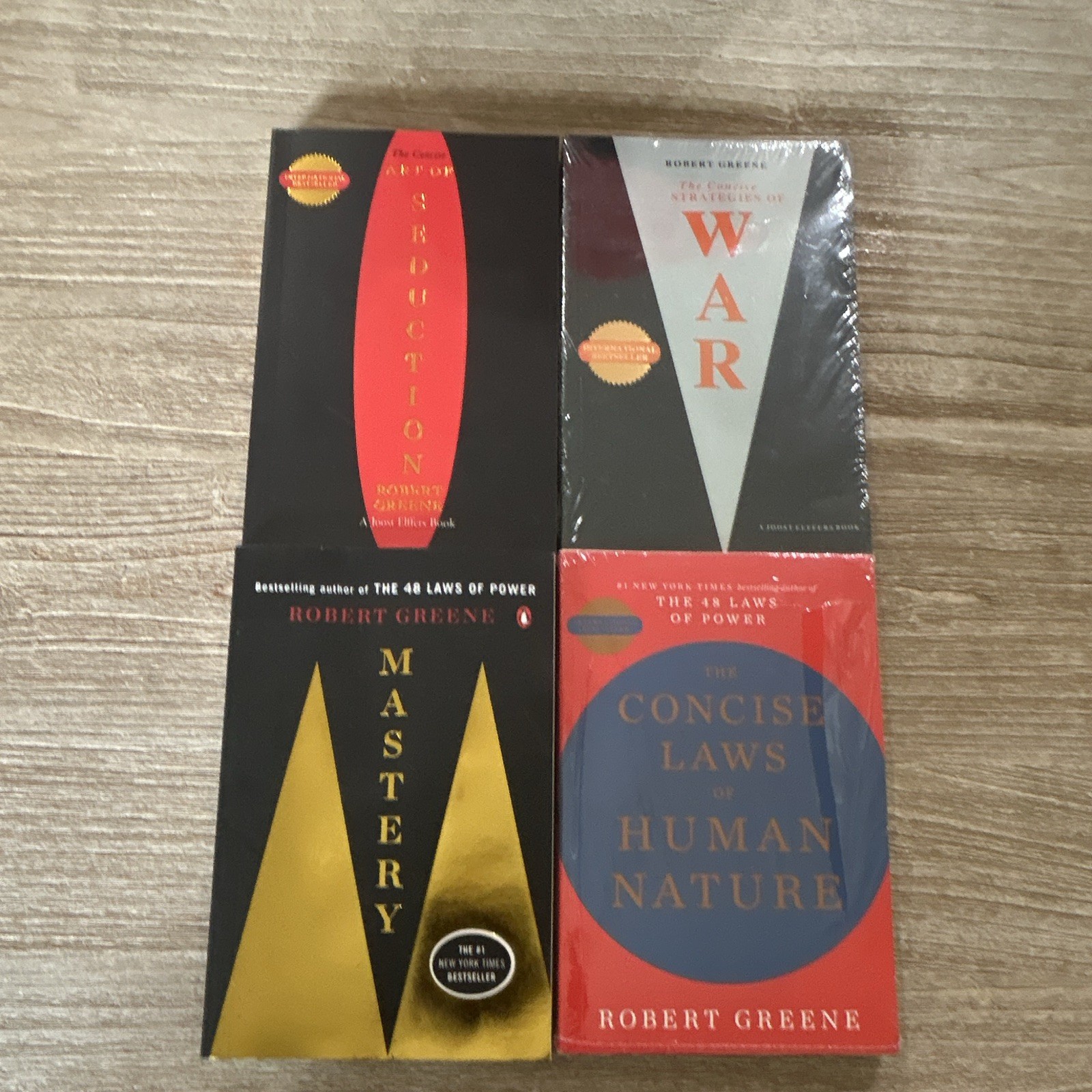 4 Ct Robert Greene Books (Seduction, War, Mastery, And Human Nature)