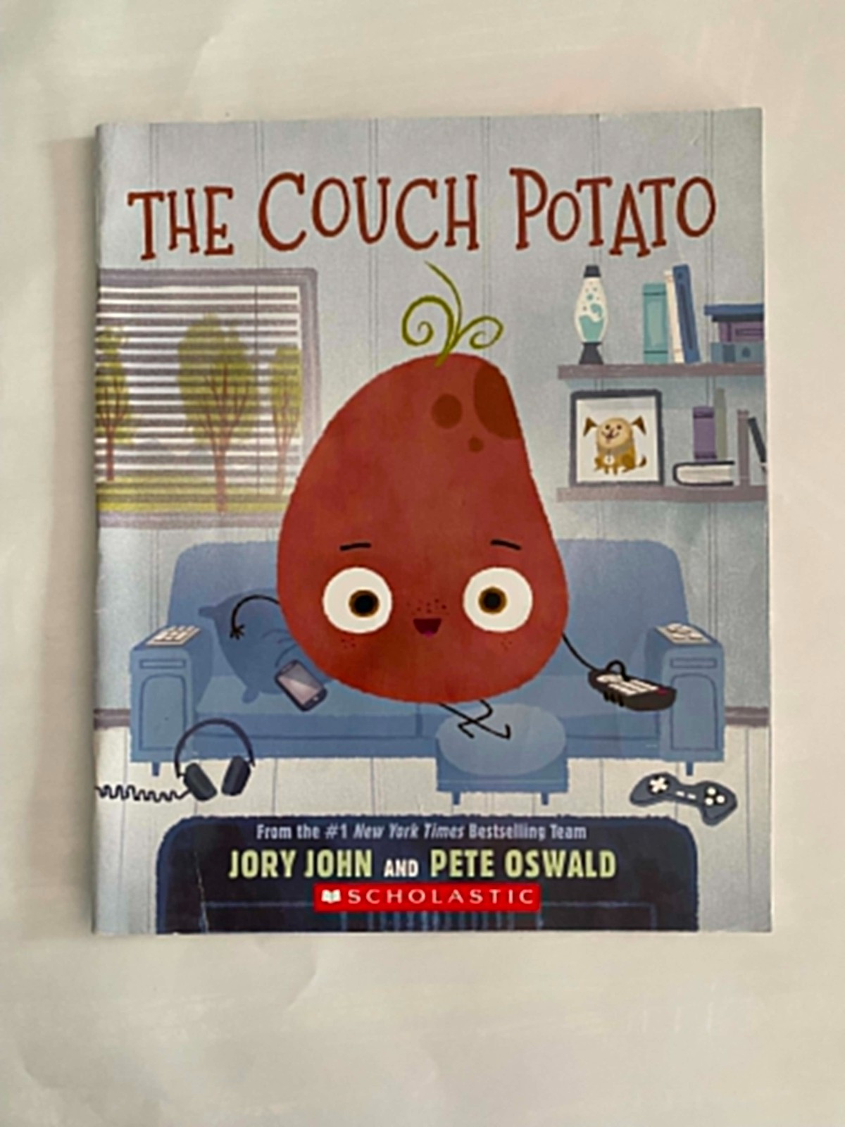 The Couch Potato by Jory John and Pete Oswald – Scholastic Paperback Acceptable