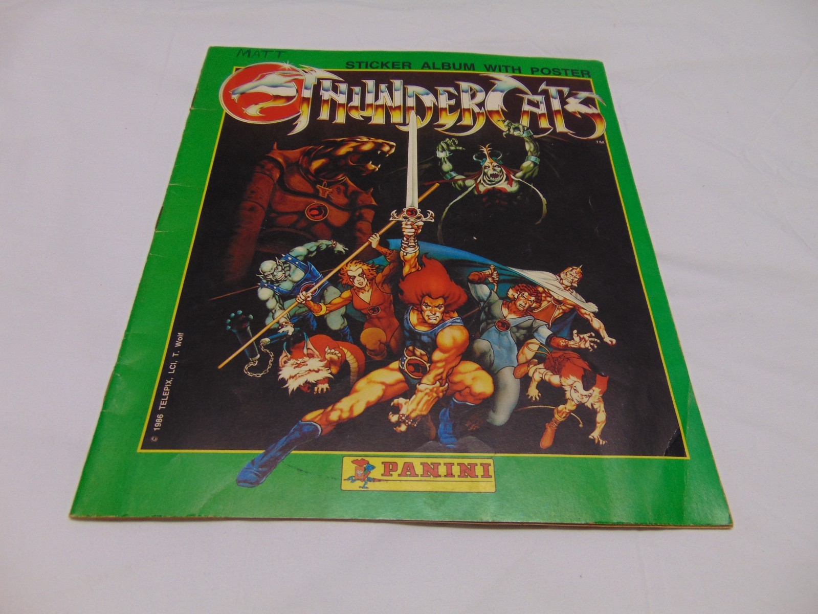 1986 Panini ThunderCats Sticker Album paperback book with 16 stickers