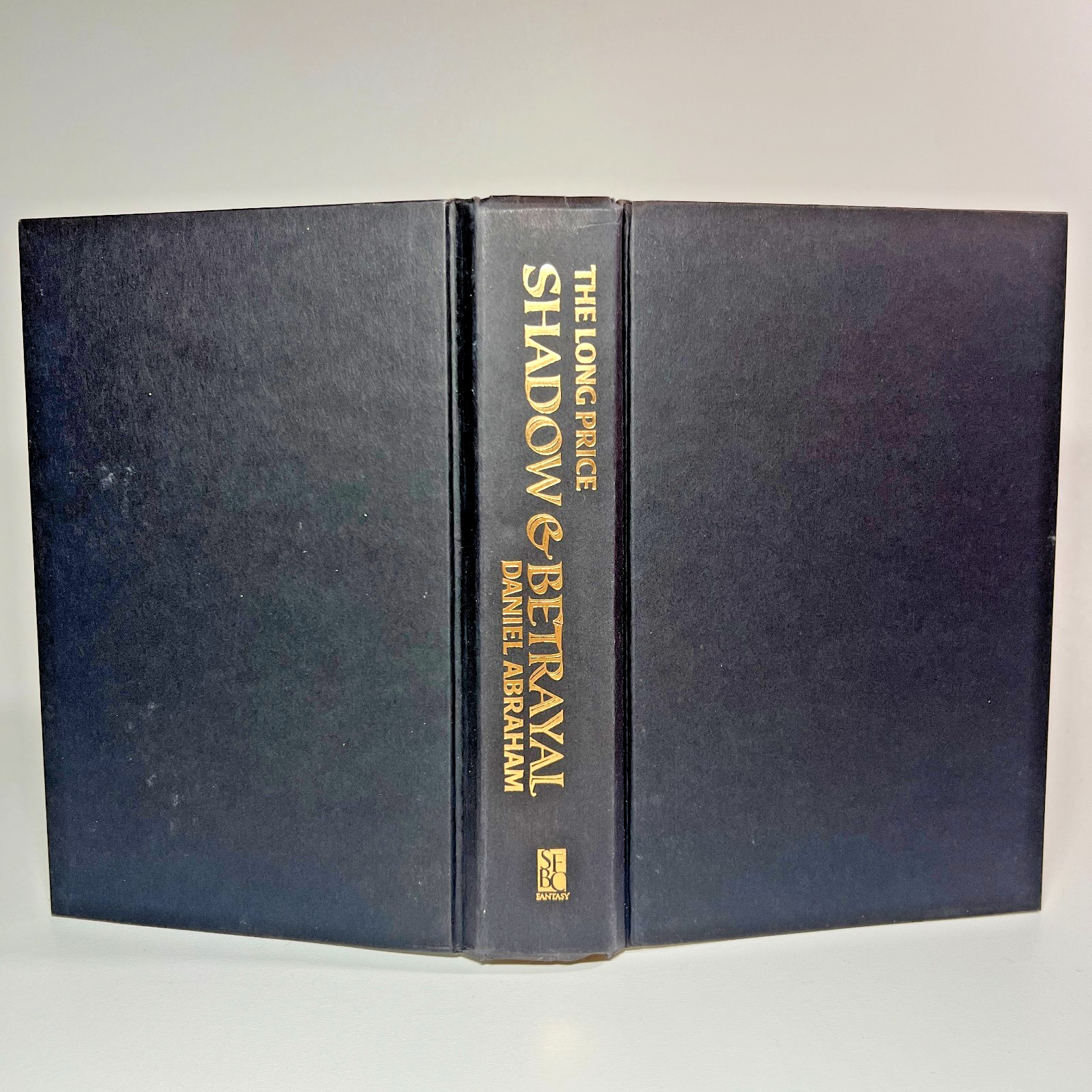 Shadow and Betrayal Daniel Abraham Hardcover Omnibus SFBC Long Price Quartet 1 2