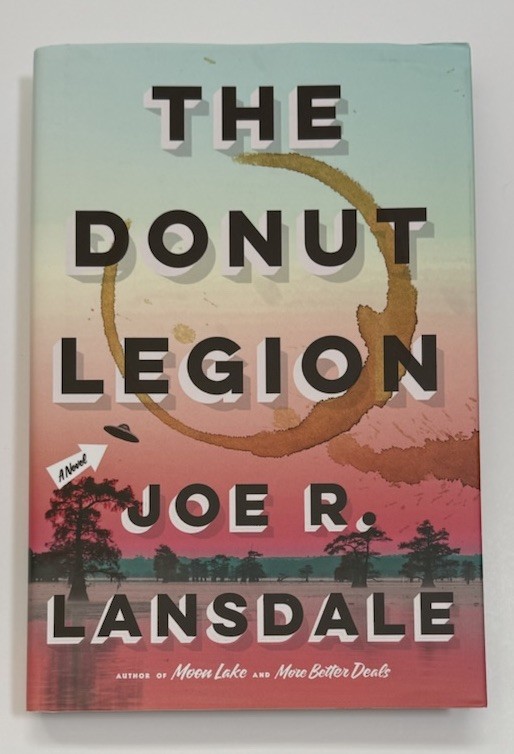 The Donut Legion: A Novel – Hardcover by Joe R. Lansdale Dark Humor Cult Culture