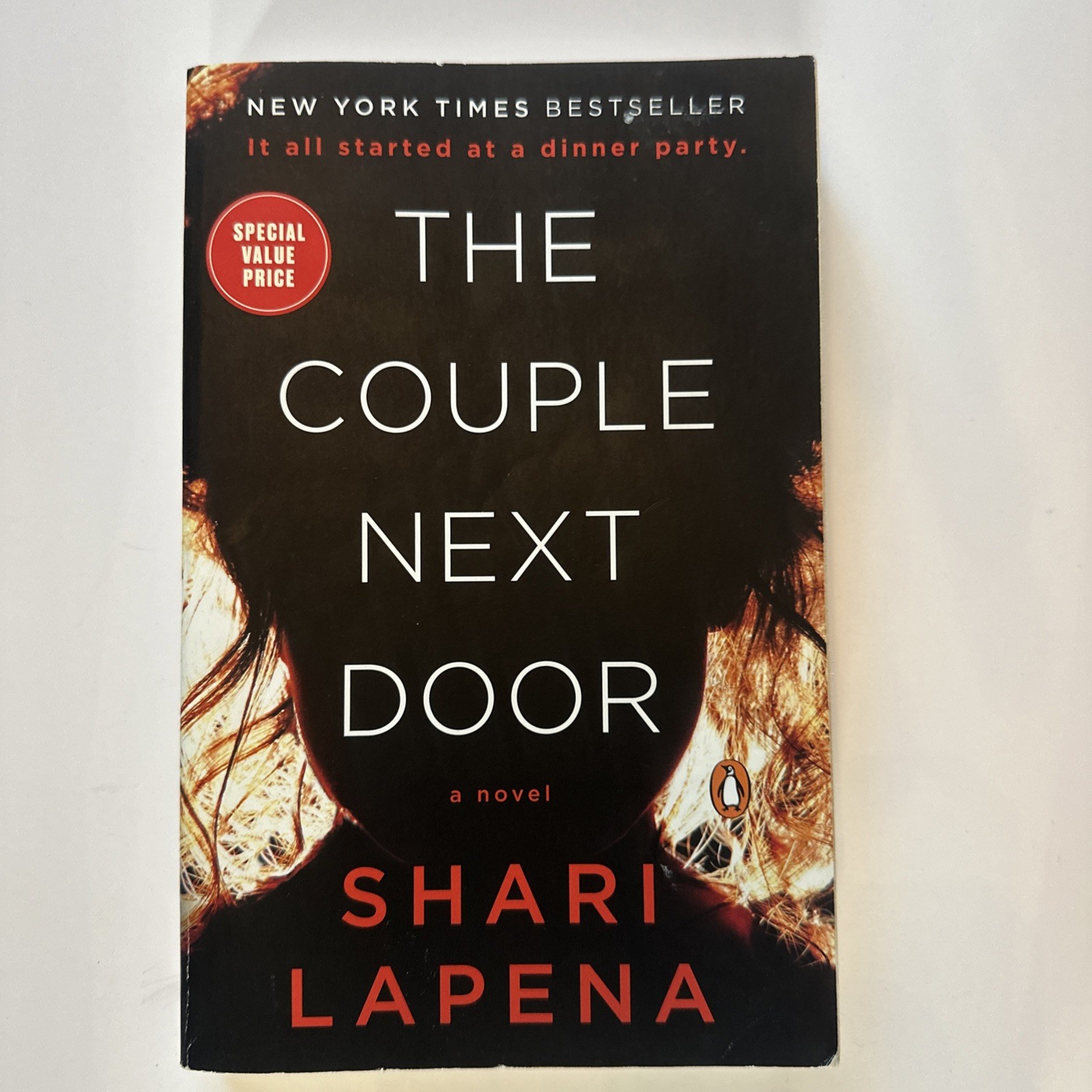 The Couple Next Door: A Novel – Paperback – By: Shari Lapena